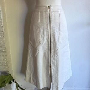 Diane Von Furstenberg white midi skirt with zipper closure and pockets.